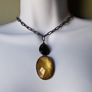 Women' Necklace  length is adjustable in the back.